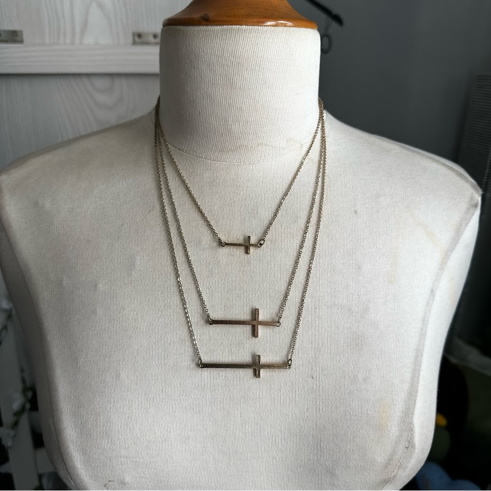 Goldtone triple cross necklace